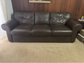 Brown faux leather couch