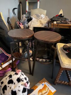 Brown and black bar stools