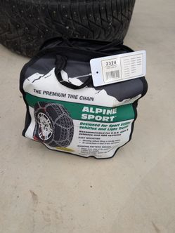 Premium tire chains. New in package.