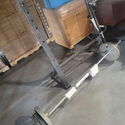 Bench Press with Olympic Bar + weight plates $220 - Obo