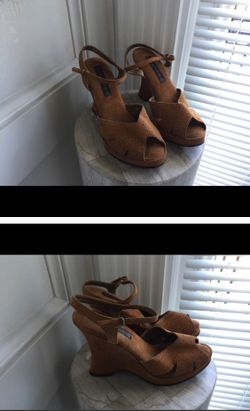 Suede peep toe wedge sandals.