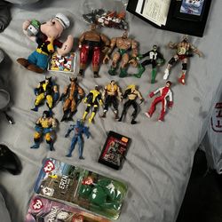 lot of vintage action figures and collectibles 