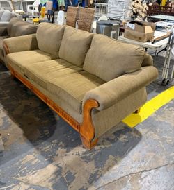 Tan Sofa with Wood Trim