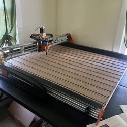 The FoxAlien Vasto XXL is a CNC router machine with a large working area of 39.37" x 39.37" x 3.7" (