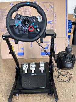 Title: Logitech G29 Racing Wheel + Shifter + Pedals + Stand – PS5 / PS4 / PC  Price: $220  Logitech G29 racing wheel setup for sale.  Includes:  * Log