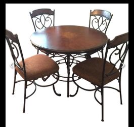 Ashley's Nola Round Dining Table w/ 4 Chairs