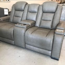 The Man-Den Grey Power Reclining Loveseat with Console by Ashley 