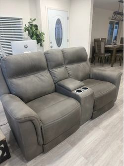 MOVING SALE – 2 Power Reclining Loveseats 🛋️  Selling two gray reclining loveseats