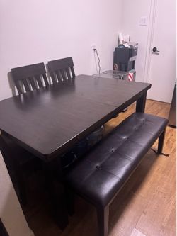 Dining room table with bench and chairs