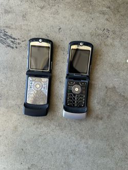 2  different  Antique Motorola flip phone