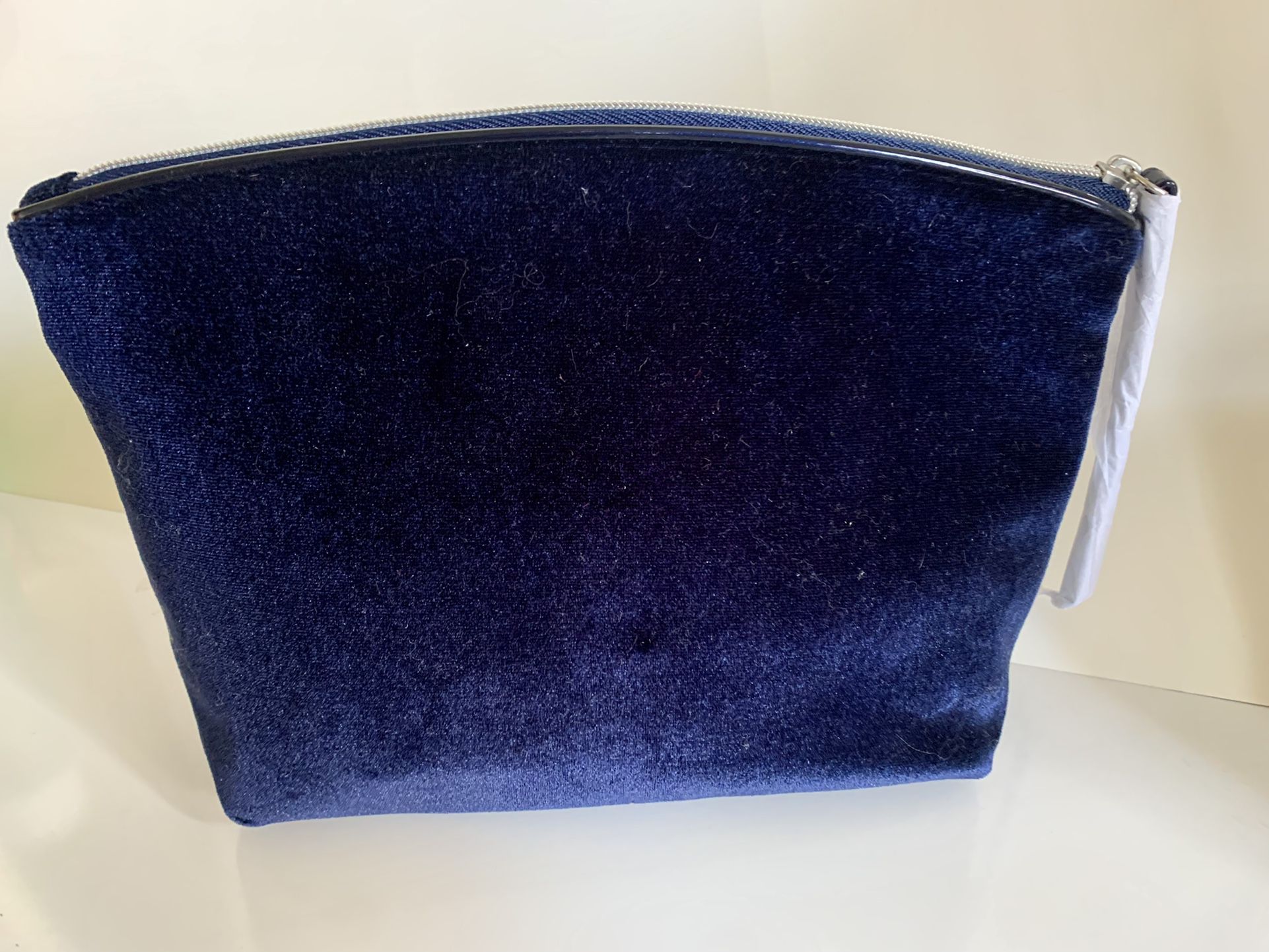 Blue velvet makeup bag. New. 10” wide, 7” tall and 3” width.  