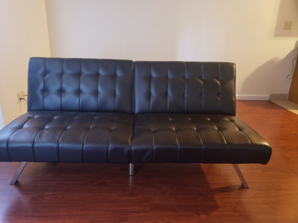 Faux leather futon great condition