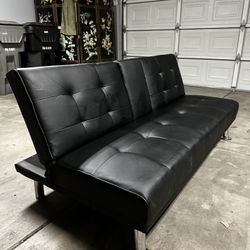 Black leather reclining couch 