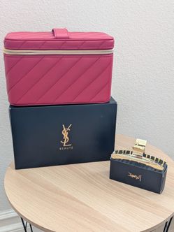 Y S L vanity and claw clip