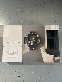 Threshold Interlocking Wall Self