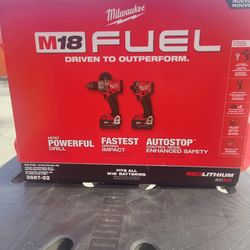 Milwaukee Fuel Hammer Drill, Impact Driver, 2 5ah Batteries, Charger And Case
