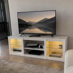 65” TV stand (new in the box)