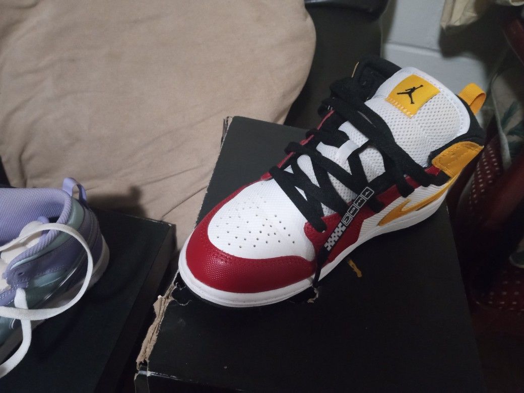 Youth Shoes And One Woman's Pair