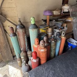 Many Cylinders For Sale Some Full Some Not