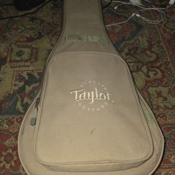 selling Taylor GS Mini Mahogany acoustic guitar its gig bag 