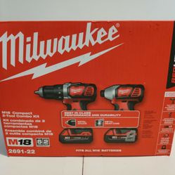 Brand New Inbox Milwaukee Two Pack Combo Drills Battery Charger Bag