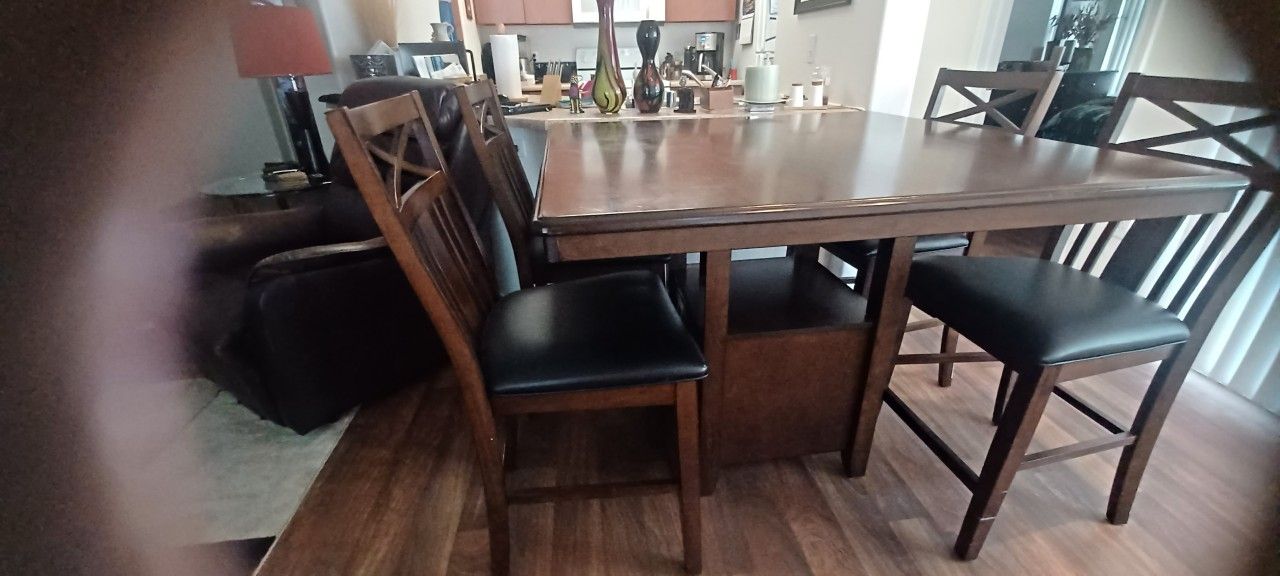 $ 75 Table 4 chairs  