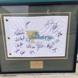 2011 President’s Cup Flag - Signed By Tiger Woods, Phil Mickelson, Dustin Johnson, Freddie Couples, Entire Team, Captains and Co-Captains