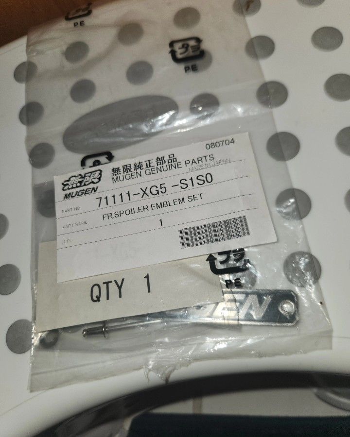 Brand New Mugen Authentic Bumper/ Lip Badge