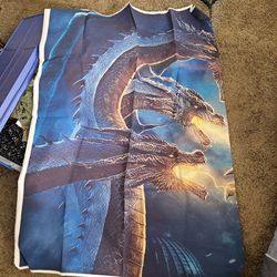 Huge godzilla  banner fabric was used for a birthday party. About the size of a full Size Bed cover.