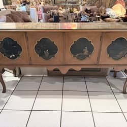 Vintage Oriental-style buffet or credenza featuring four doors with traditional landscape paintings
