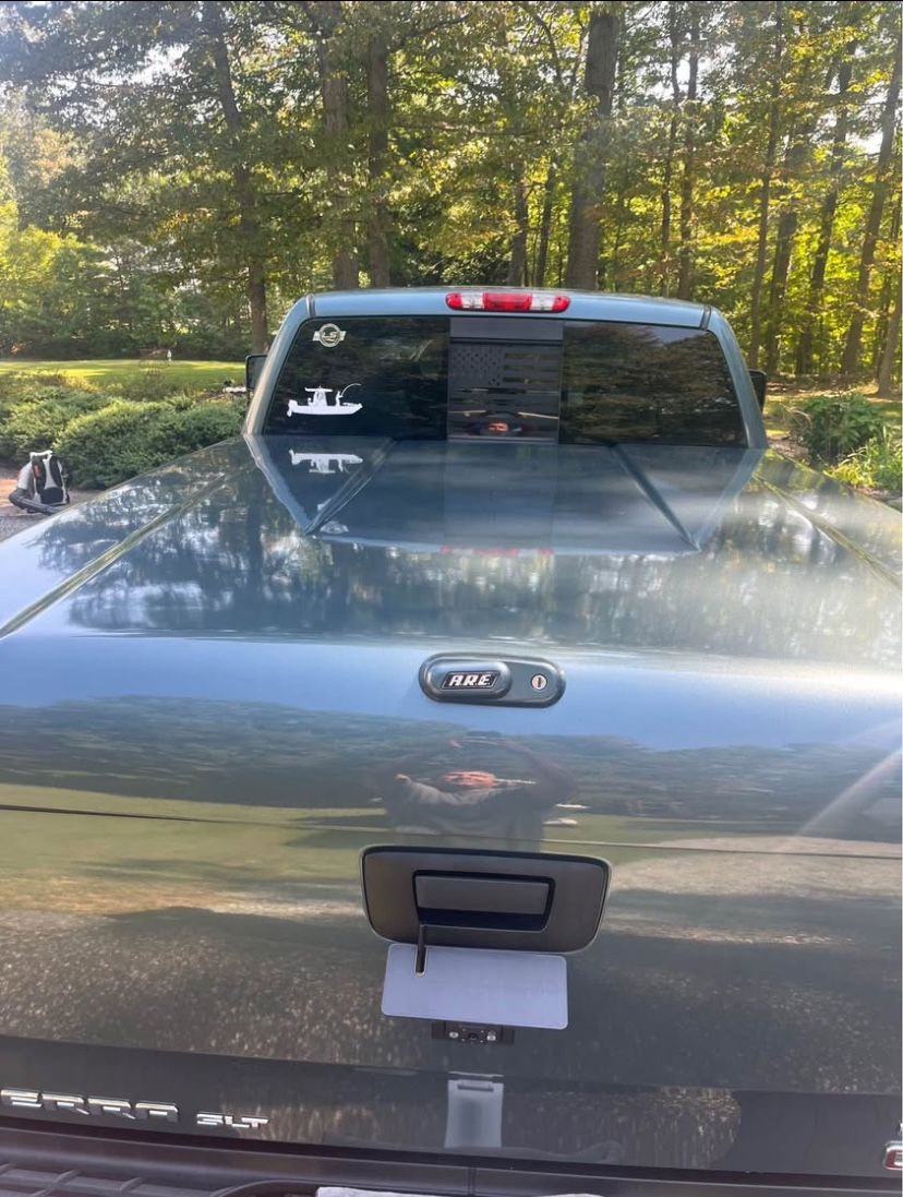 Fiberglass A.R.E 6.5 foot truck bed cover