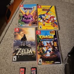 6 Nintendo switch games Mario kart 8, Mario odyssey, sonic, Zelda breath, Crash Bandicoot, spyro