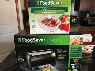 FOOD SAVER VACUUM SEALING SYSTEM