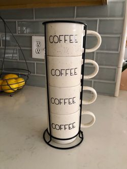 Set of 4 coffee cups with holders