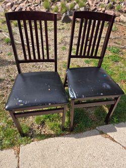 2 folding chairs well loved