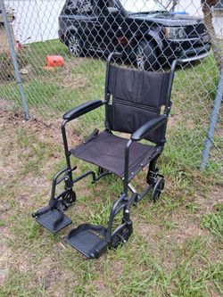VERY NICE  FOLDABLE WHEEL CHAIR