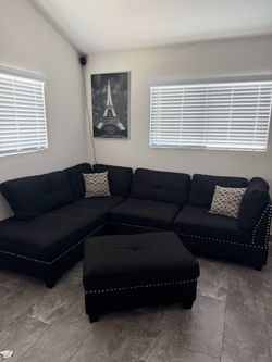 Black cloth sectional couch