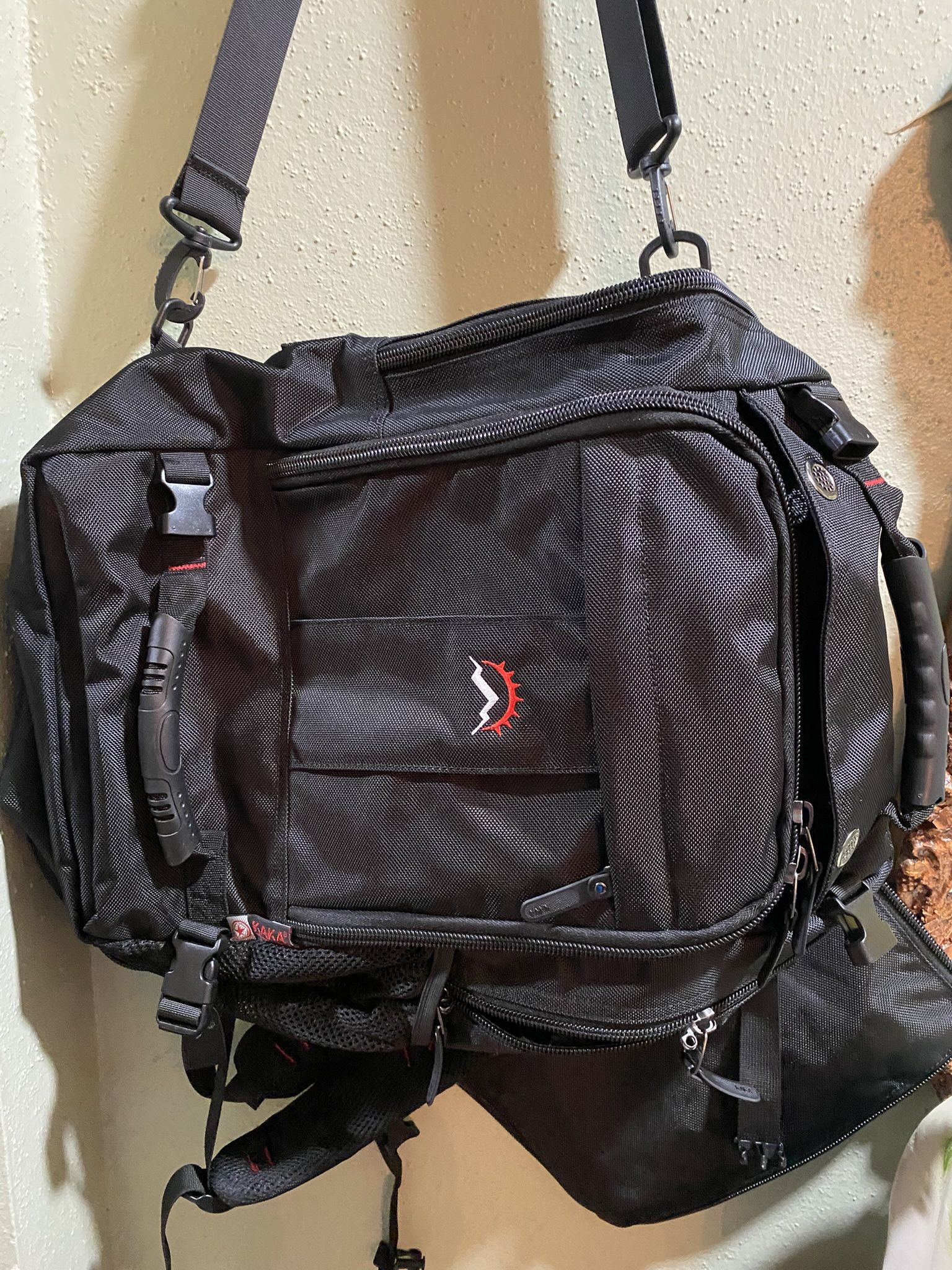 KAKA Travel Backpack, Carry On Flip to Duffel Bag Black, new