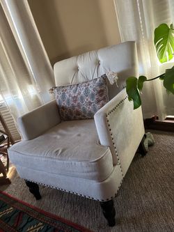 Pair of Tufted Accent Chairs with Nailhead Trim
