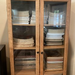 Extensive Collection Of Piano Music And Bookcase