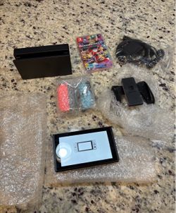 Nintendo Switch with Neon Blue & Neon Red  with Joy-Con Controllers + Mario Kart 8 Deluxe game