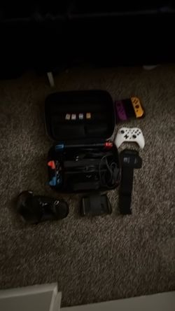 Nintendo Switch With Case, Extra Games, And Controllers