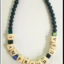 Designer original, I am proud USA. Choker hand beaded necklace