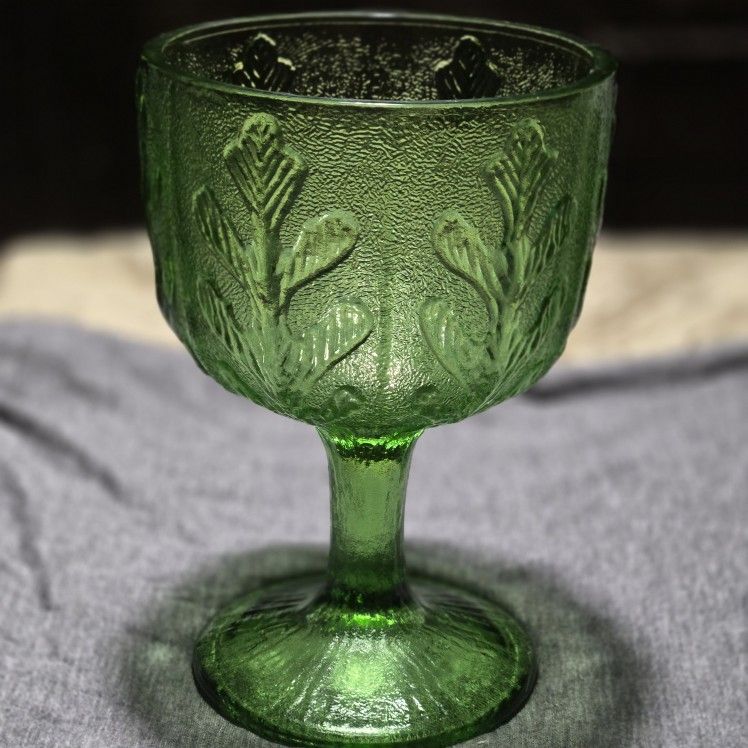 Vintage FTD 1975 embossed Green goblett.