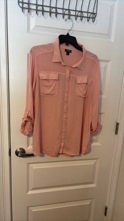 Ladies Three-Quarter Or Long Sleeves Has A Button To Adjust