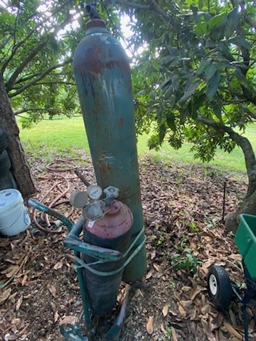 Welding Tanks Out Of Storage Unit Includes Hose
