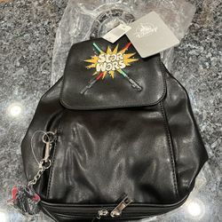 Disney Parks Star Wars Lightsaber Black Backpack Bag.  Brand new with tags.  The picture does not reflect how nice this bag is.  It’s also really soft