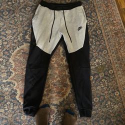 grey black nike tech pants