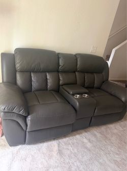 Black leather recliner couch