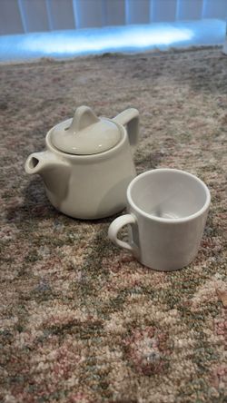 One Teapot And Cup